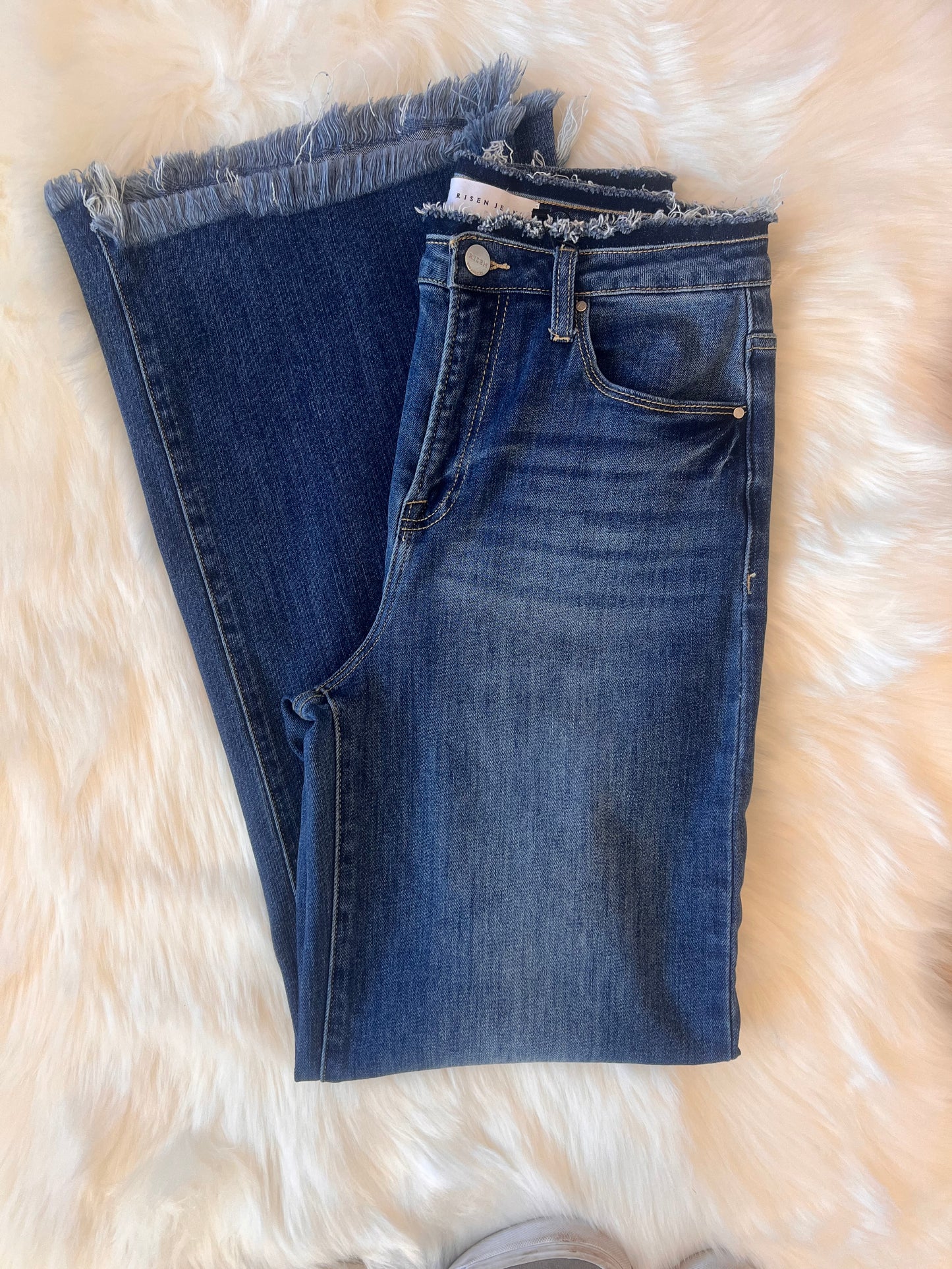 Risen High Rise Wide Leg Frayed Hem Jeans