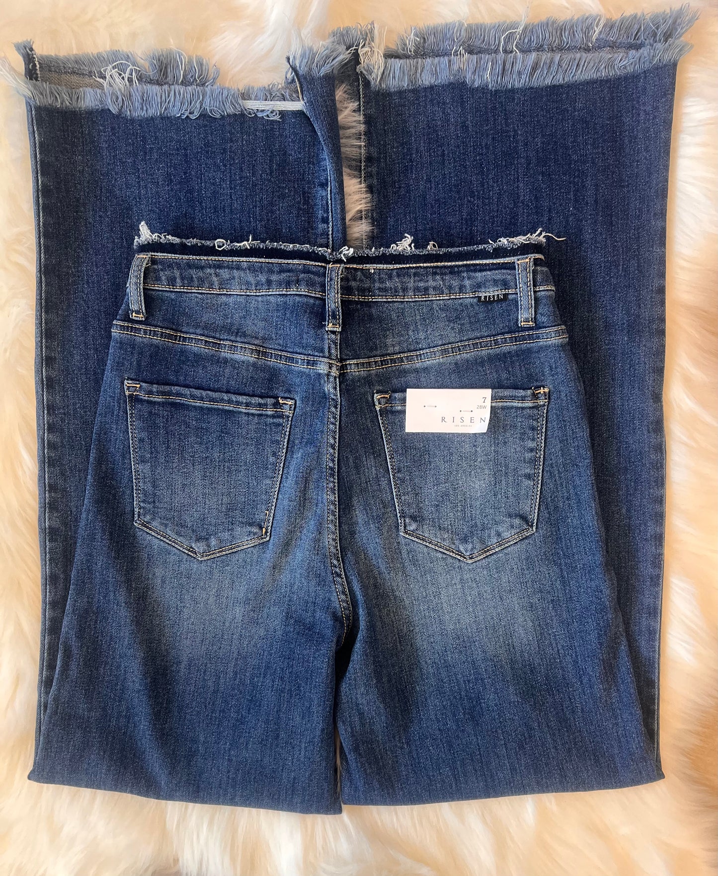 Risen High Rise Wide Leg Frayed Hem Jeans